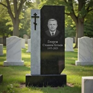 Надгробен паметник от черен гранит с православен кръст и гравиран портрет